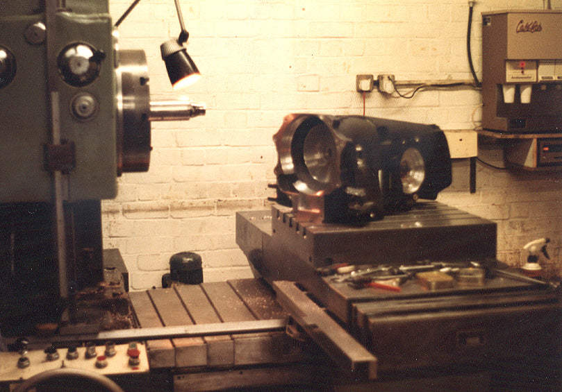 Complex engineering component on a machine table in the original workshop