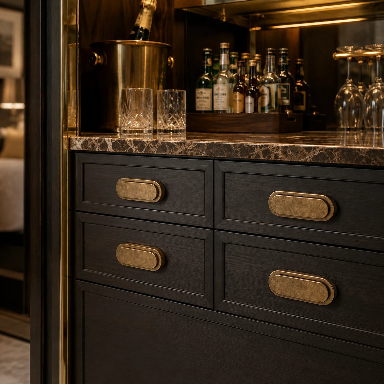 Illustrative hotel bar and minibar cabinetry with Capramont Farringdon cup pulls